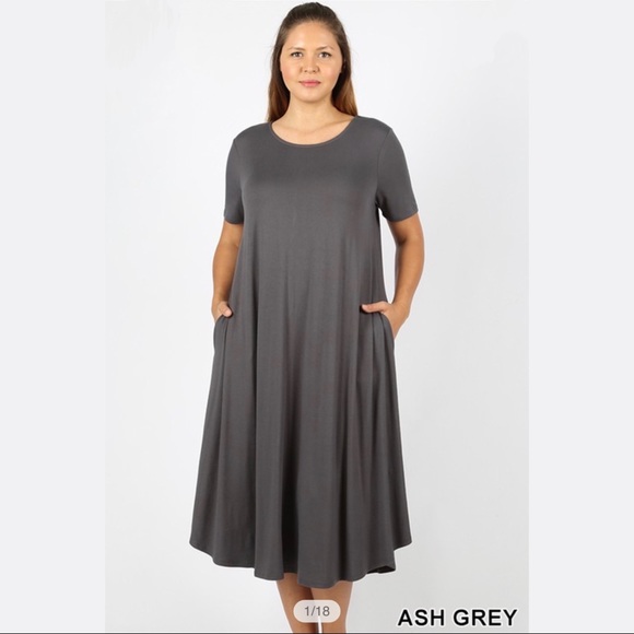 Zenana Outfitters Dresses & Skirts - Viscose plus short sleeve round neck pocket dress.